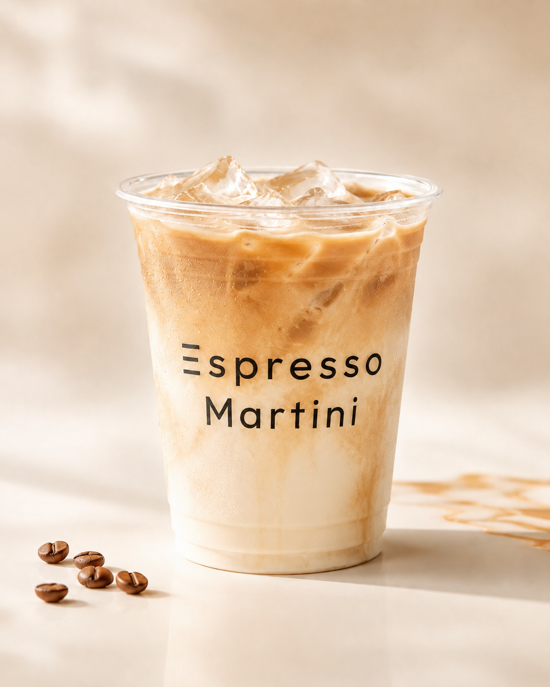 Iced Spanish latte in a clear Espresso Martini cup